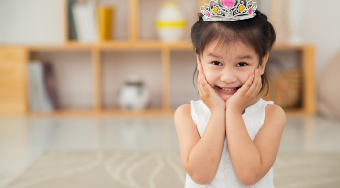 A girl wearing a tiara.