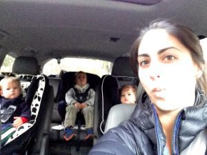 A family selfie in the minivan that I love to hate.