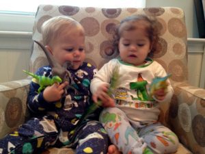 Still in their jammies seconds before fighting over dinos. 