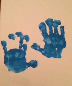 These handprints actually make me and my husband laugh, because they look nothing like my son's... but we know they are his because he never sits still and totally smeared the paint! 