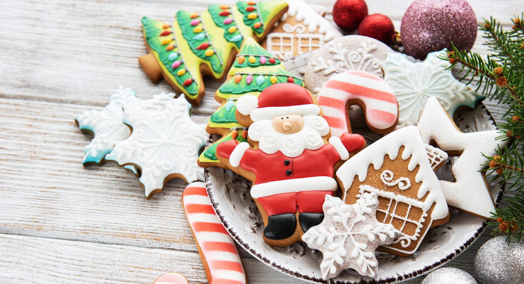 A plate of decorated Christmas cookies. 