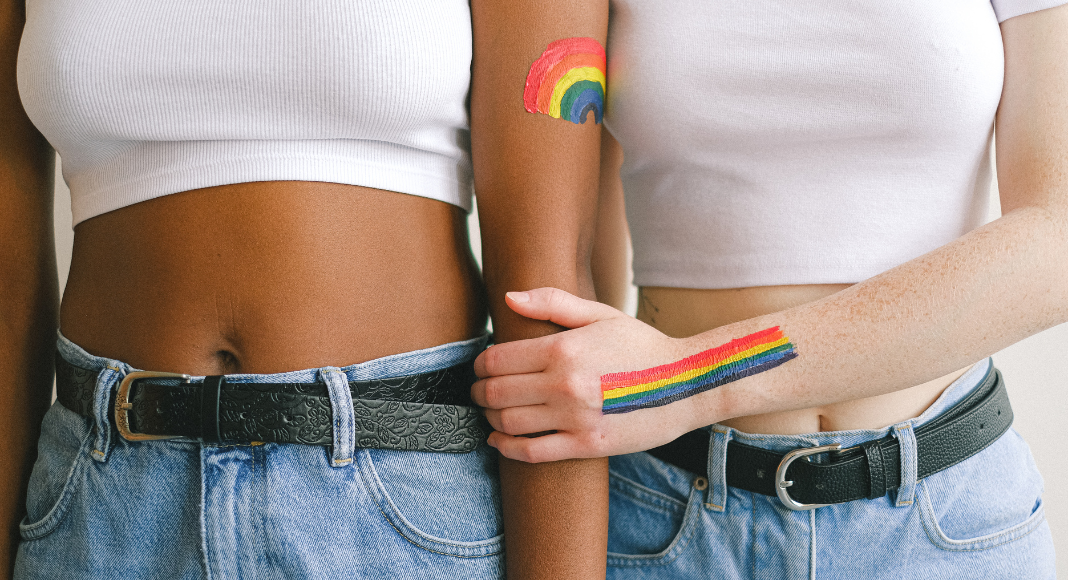 LGBTQIA+ World - Women with pride paint.