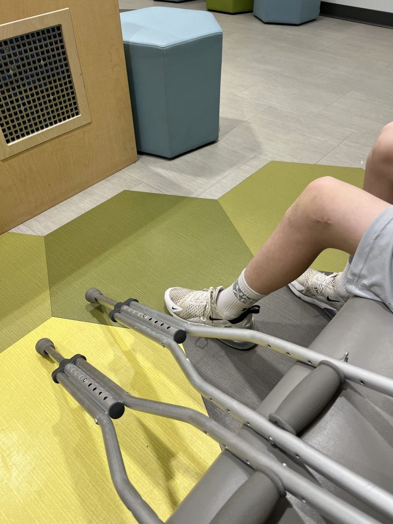 Child using crutches after surgery